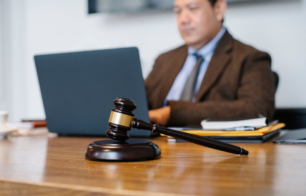 A lawyer reviews a file, with case documents prepared for legal scrutiny